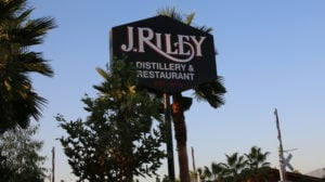 J Riley Sign